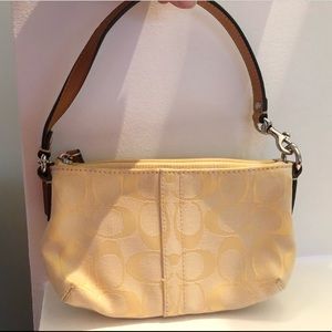 Gorgeous new condition vintage gold coach wristlet